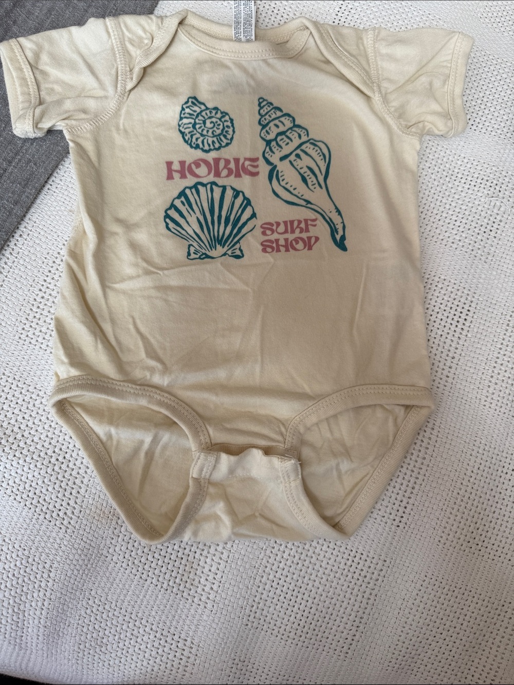 Hobie Cream One-Piece with Teal Shell Graphics and Pink Logo